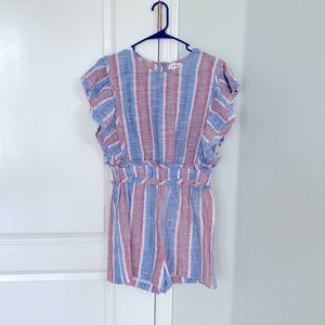 Boutique romper new without tags. Size medium.